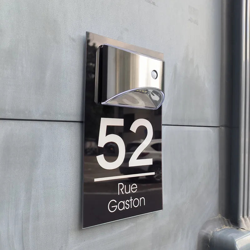 Solar powered house plaque