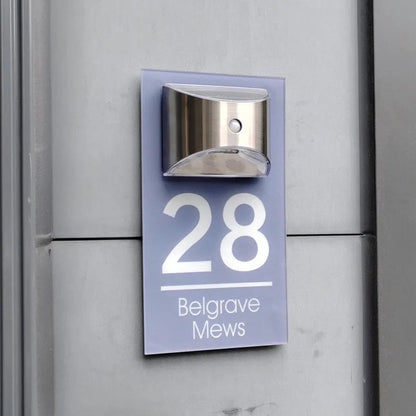 Solar powered house plaque